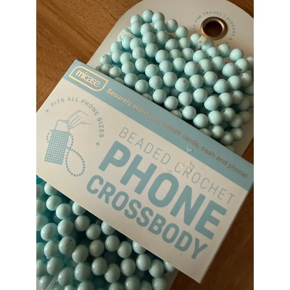 The Micase Light Blue Beaded Crochet Phone Crossbody